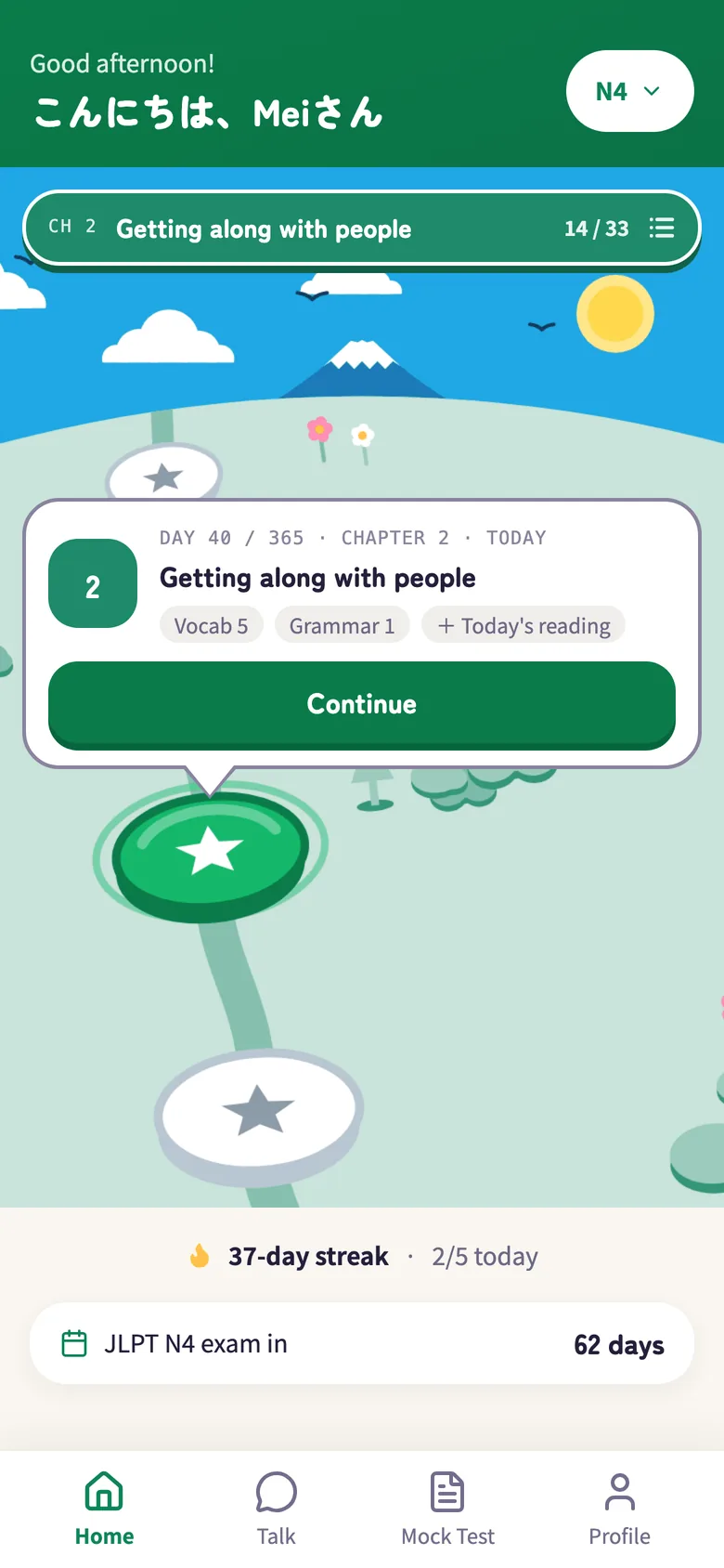 The app home screen: today's lesson and a Continue button on a path up Mt. Fuji